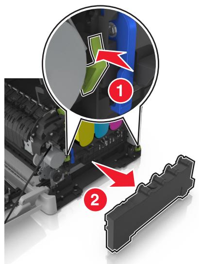 LEXMARK CX517DE - Appuyez sur les leviers de couleur verte situés de chaque côté de la bouteille de récepération de toner, puis retirez cette dernière. - 1