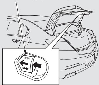 Acura TL (2014) - Déverrouillage d'urgence du coffre - 1