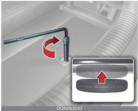 KIA Telluride Phase 2 (2023) - Rangement du pneu de secours - 1