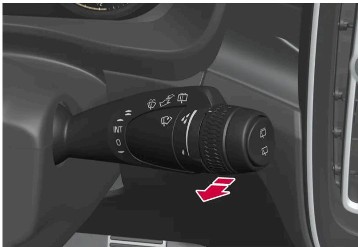 VOLVO C40 (2024) - Activier le lave-glace et le lave-phares - 1