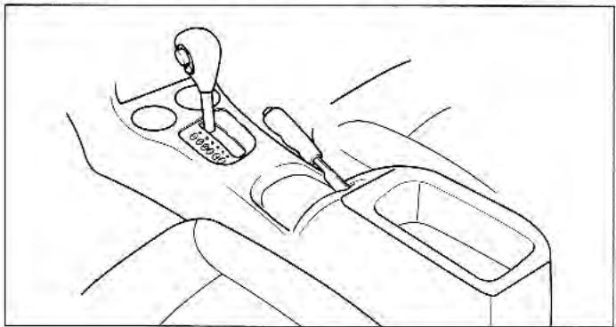 KIA Rio (2003) - Porte-tasses et Compartiment de la Console Centrale - 1