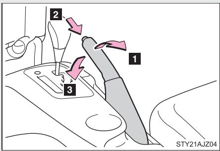 Scion IQ (2012) - Desserrage du frein de stationnement - 1