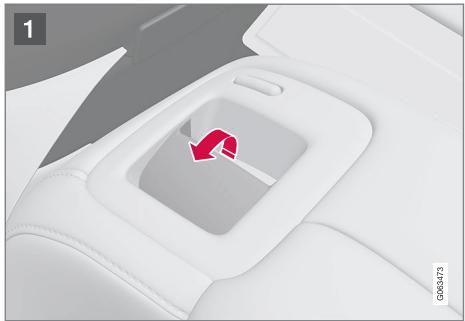 VOLVO V60 2 - Rabattre l'appui-tête extérieur de banquette arrière avec la poignée - 1