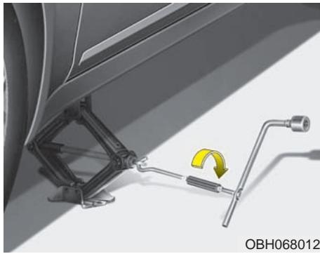 KIA Magentis MG (2005-2010) - Avertissement - changer une roue - 3