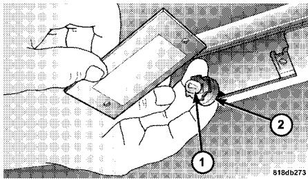 Chrysler 300 (2013) - Éclairage de la plaque d'immatriculation - 1