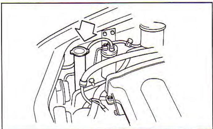 KIA Spectra (2000-2004) - Vérification du niveau de liquide lave-glace - 1