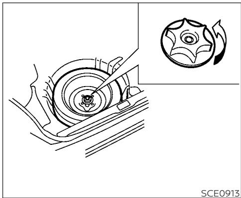 NISSAN Kicks (2024) - Retrait de la roue de secours et des outils du coffre - 3