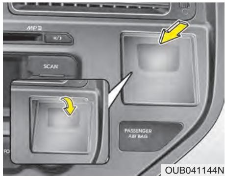 KIA Rio (2014) - Accoudoir coulissant (si équipé) - 1