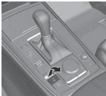 MAZDA CX-30 (2019) - Pour serrer manuellement le frein de stationnement - 1