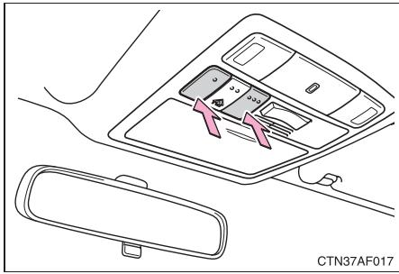 TOYOTA Highlander (2009) - Réinitialisation de la mémoire de l'émetteur HomeLink® (ensemble des 3 programmations) - 1