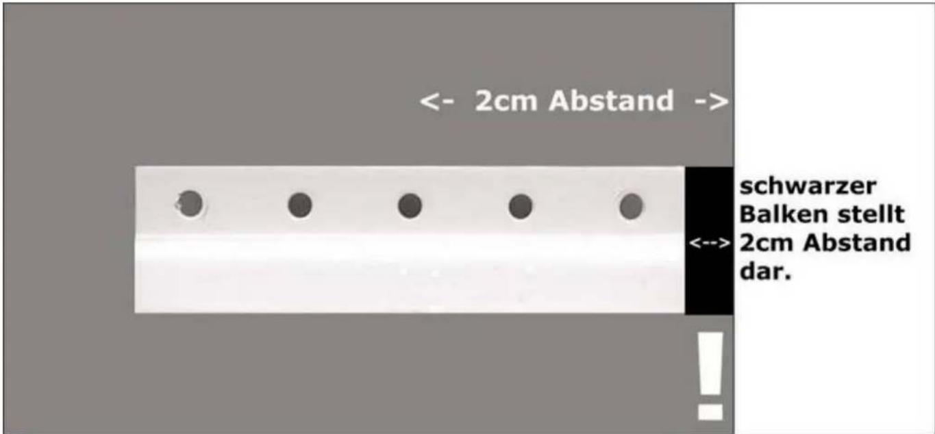 PKM KS 130.0 - White plastic electrical outlet bracket with two circular holes (no text or symbols visible)
The fridge can subsequently be restarted, see Page 6. - 1