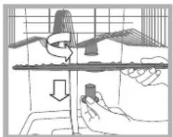 INDESIT DFG 262 S EU - Nettoyer les bras de lavage - 1