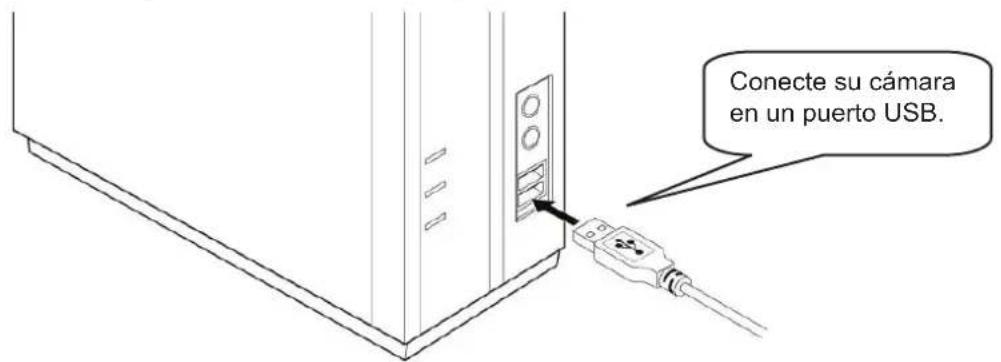 Conecte su cámara en un puerto USB.