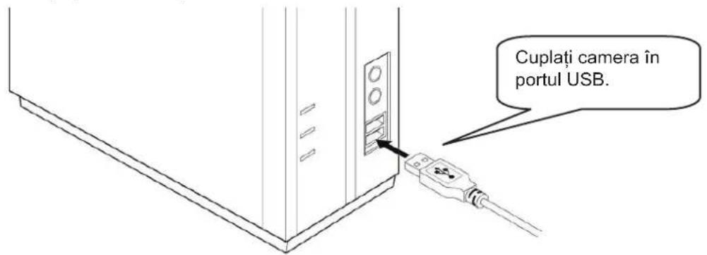 Cuplați camera în portul USB.