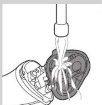 PHILIPS PowerTouch PT717 - Pulizia del rasoio sotto l'acqua corrente - 2
