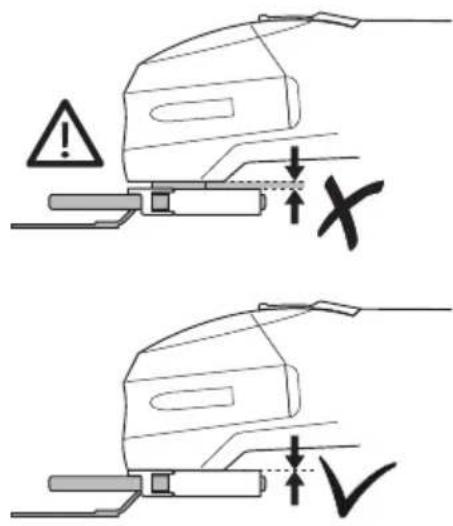 Technical diagram showing two mechanical components with warning symbols and dimension labels 'x' and 'v'