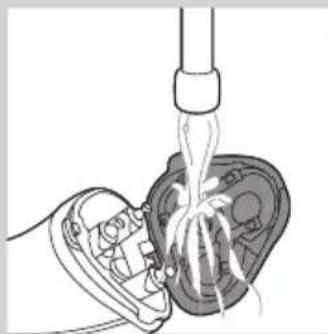 PHILIPS 29PT8457 - De scheerunit schoonmaken onder de kraan - 2