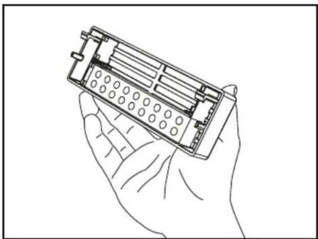 Line drawing of a hand holding an open battery pack with internal circuitry (no text or symbols).
