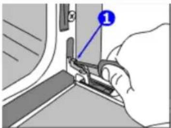 Diagram showing a hand holding a mechanical component with a numbered label pointing to the component.