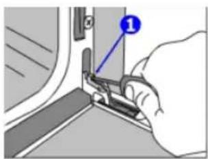 Diagram showing a hand using a tool to adjust or install a component, with a numbered label pointing to the component.