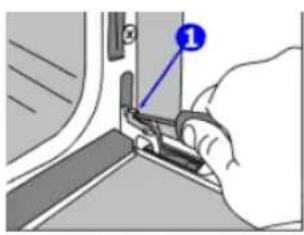 Diagram showing a hand using a tool to adjust or install a component, with a numbered label pointing to the component.