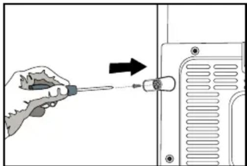 Hand holding a screwdriver inserted into a device panel, with an arrow indicating direction (no text or symbols present)
