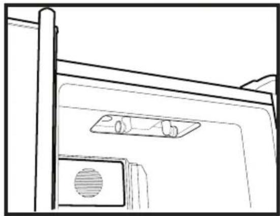 Line drawing of a door with a vent and a small inset showing a device (no text or symbols)
