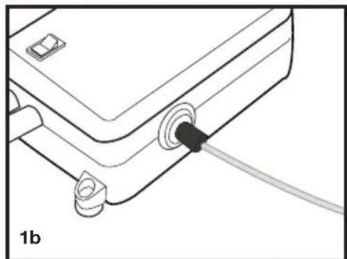Technical line drawing of a mechanical component with a coiled cable and mounting features (no text or symbols)