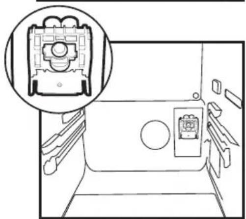 Line drawing of a vehicle interior with a highlighted camera module (no text or symbols)