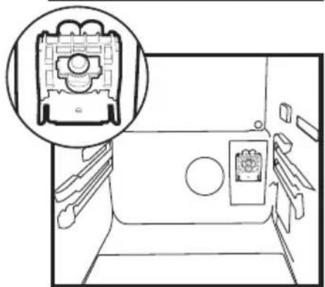 Line drawing of a vehicle interior with a circular inset showing a device component (no text or symbols)