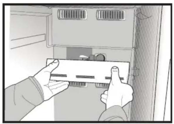 Illustration of hands installing a component into a cabinet (no text or symbols visible)