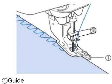 BROTHER Innovis VQ2 - Cousez le long du guide du pied-de-biche. - 1