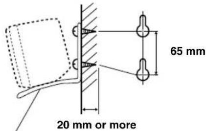 YAMAHA AVS77 - Attach two commercially available protruding screws (diameter about 4mm ) in the location on the wall where the rear speaker is to be hung, and then mount the bracket on the protruding screws. - 1
