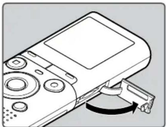 OLYMPUS VN702PC - Insertion d'une carte microSD - 1