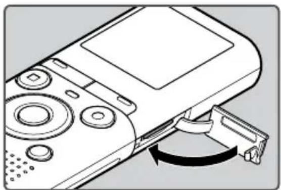 OLYMPUS VN702PC - Insertion d'une carte microSD - 3