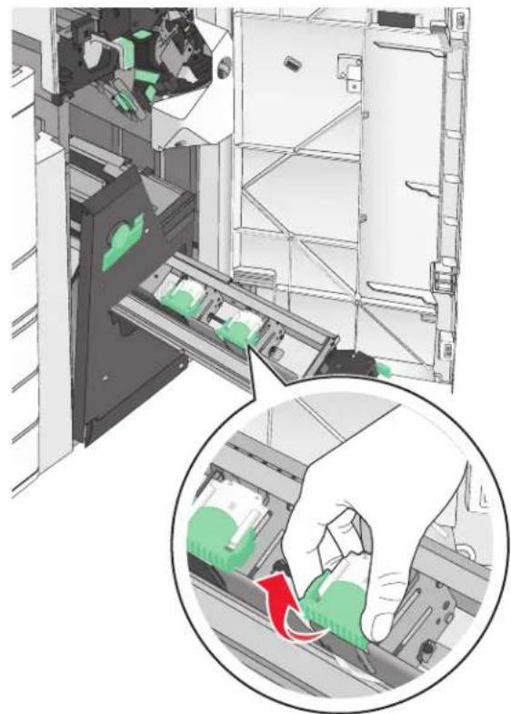 LEXMARK C950 - Remplacement de la cartouche d'agrafes dans l'unité d'agrafage de livrets - 4
