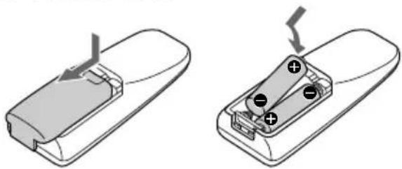 SONY MHCFR1 - Mise en place des deux piles de format AA (R6) dans la télécommande - 1