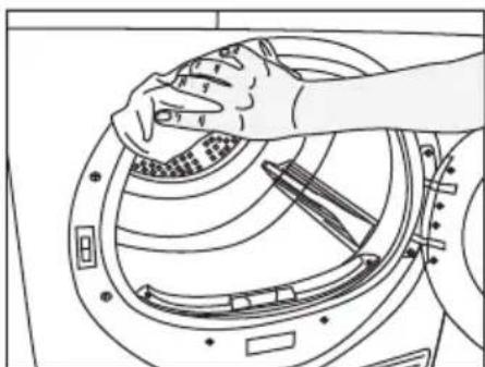 BEKO DPY 7404 X - Nettoyage du filtre à peluche / surface intérieure de la porte de chargement - 4