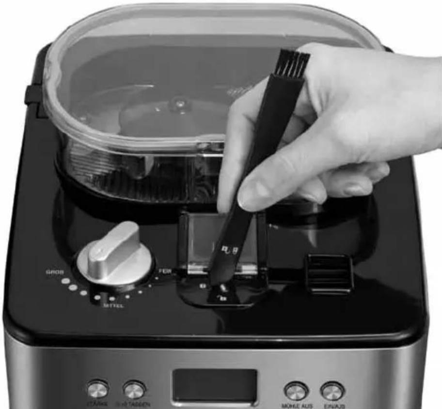 UNOLD 28716 - LIMPIAR EL DEPOSITO DE POSOS DE CAFÉ - 1