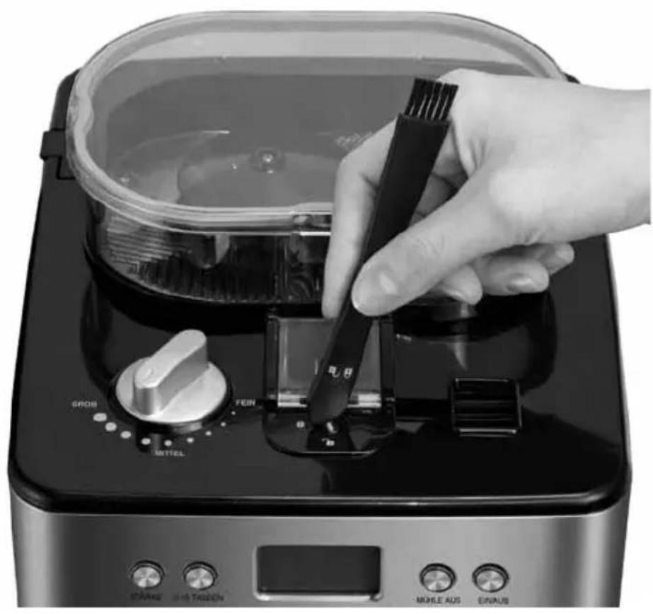 UNOLD 28716 - REINIGEN DES KAFFEESATZ-SCHACHT - 1