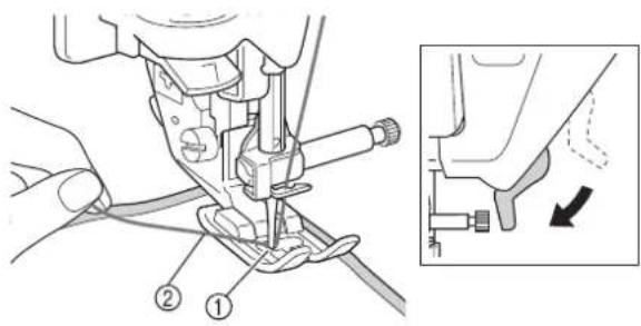 BABY LOCK Symphony BLSY - Turn the handwheel toward you (counterclockwise) to feed the needle into the fabric or punched hole. Position the upper thread over the presser foot and lightly hold then, lower the presser foot lever. - 1