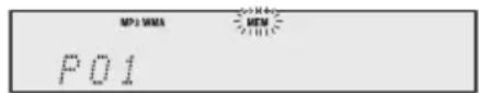 JVC UXN5 - Appuyer sur la touche [PROGRAM/MEMORY] sur la télécommande pendant le mode d'arrêt. - 1