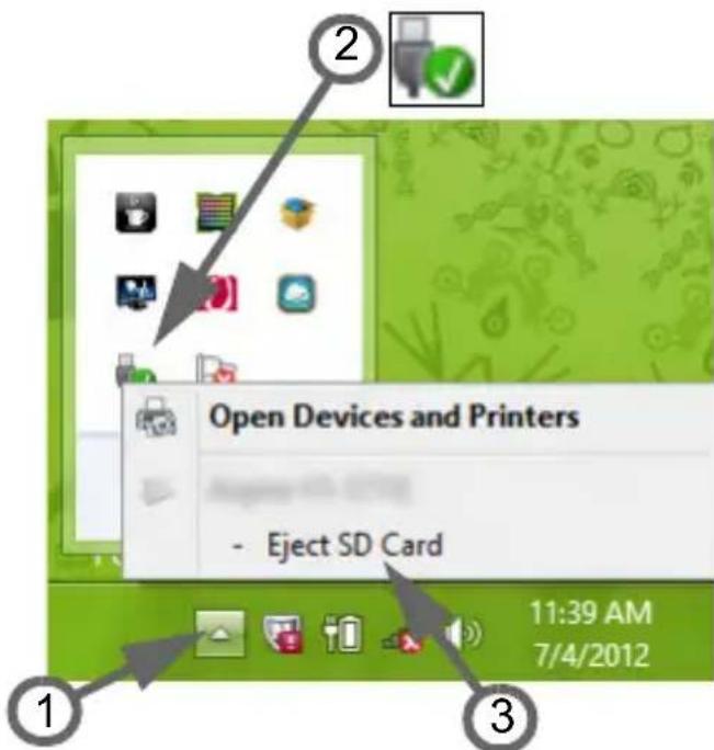 PACKARD BELL EasyNote LV - Extraer una tarjeta de un lector de tarjetas de memoria - 1