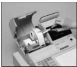 CASIO TK6000 - Pour remplacer le rouleau de la bande de contrôle - 8