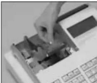 CASIO SEC300 - Pour installer le rouleau de papier du journal - 2