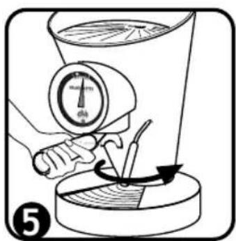 Diagram illustrating a mechanical or fluid system with labeled components and directional arrows indicating flow or movement.
