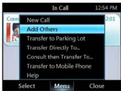 POLYCOM CX600 - Pour transformer un appel en téléconférence : - 1