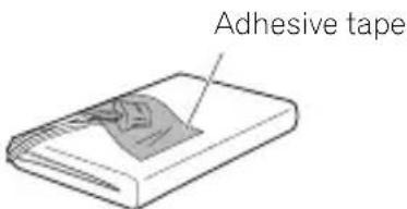 PIONEER XWLF1K - Use a piece of adhesive tape to tape the battery connector to the side of the battery. - 1