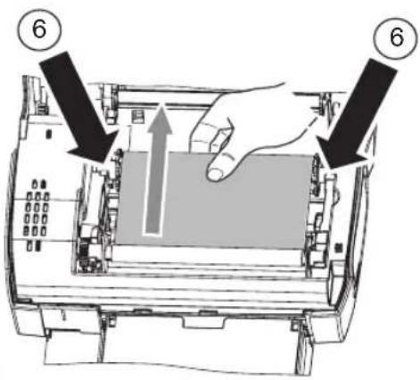 Diagram showing a hand pressing down on a device with numbered callouts (6) pointing to the component.
