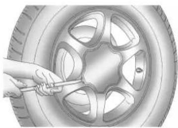 GMC Yukon (2011) - Déposed'unpneucrevéet installationdupneude rechange - 1